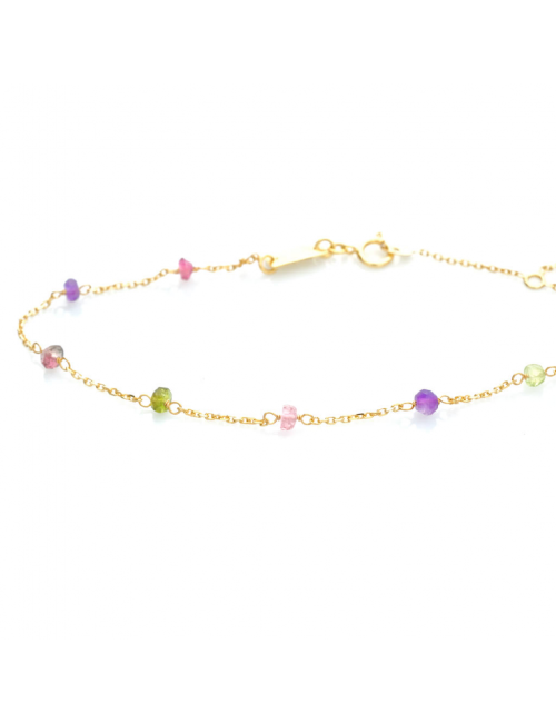 Bracelet femme orné de 9 pierres fine en or 9 carats.