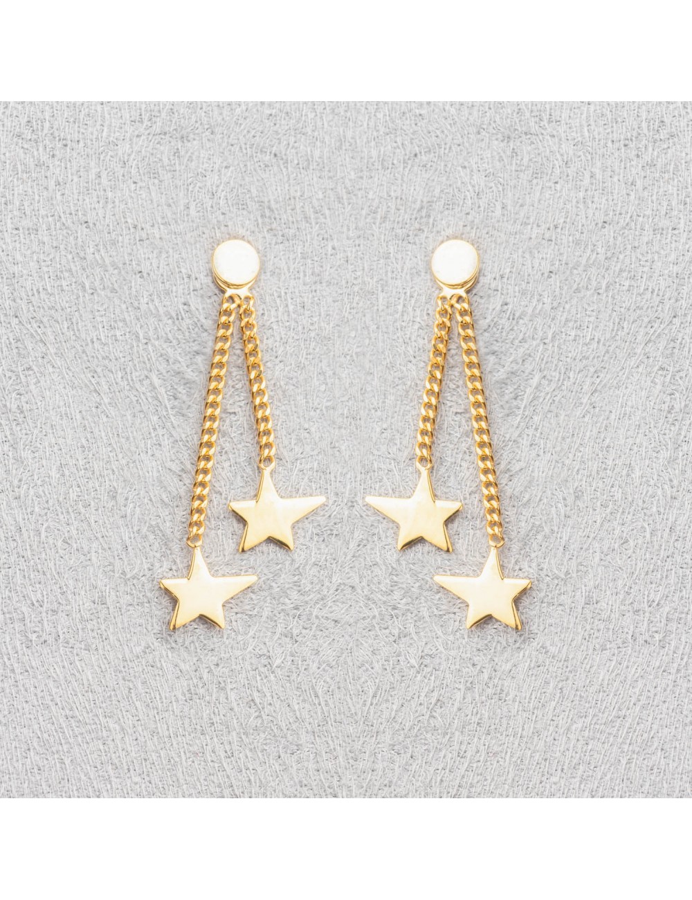 Bijou femme boucles d'oreille 2 étoiles asymétriques.