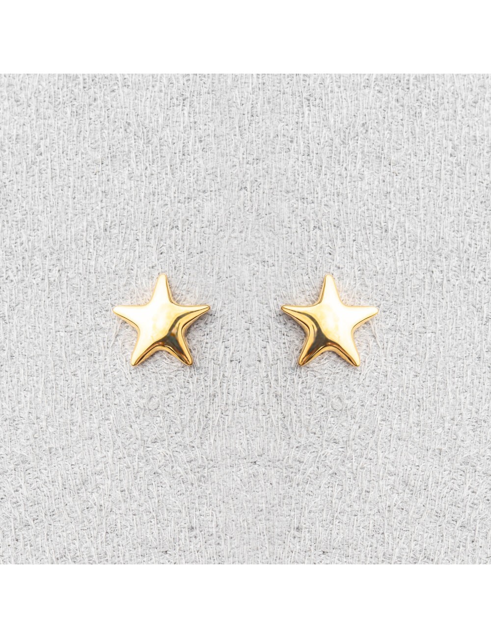 Bijou femme ou enfant boucles d'oreille étoile bombée.