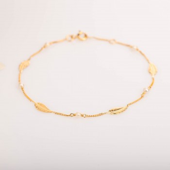 Bracelet femme plume et perle d'eau douce en or 9 carats.