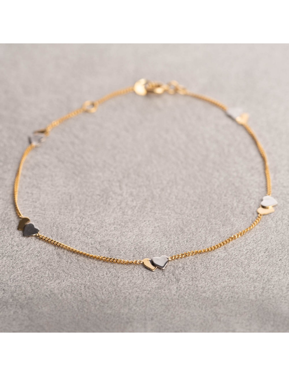 Bracelet double coeur en or 9 carats.