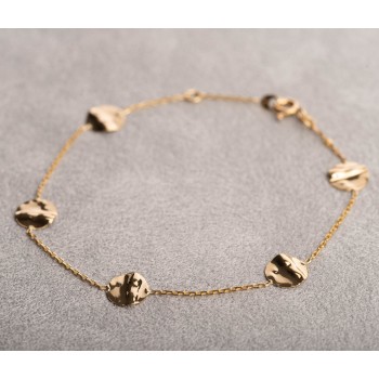 Bracelet femme orné de cinq ronds froissés en or 9 carats.