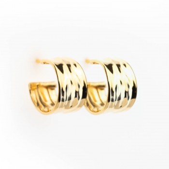 Boucles d'oreilles femme créoles en or 18 carats.