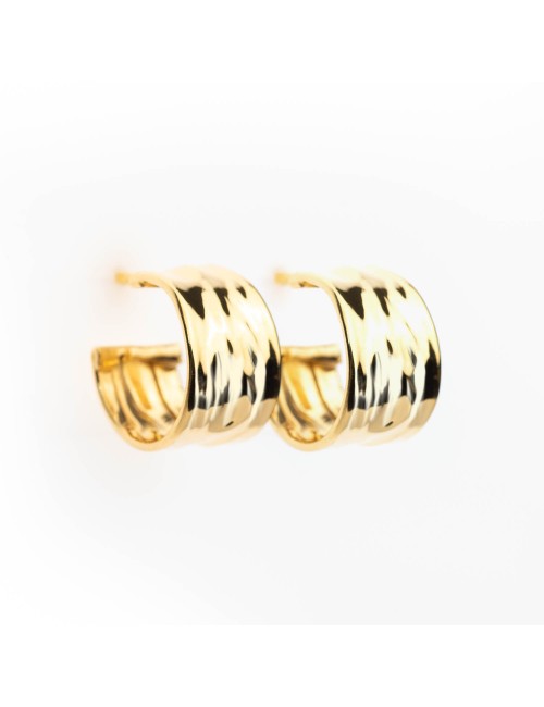 Boucles d'oreilles femme créoles en or 18 carats.