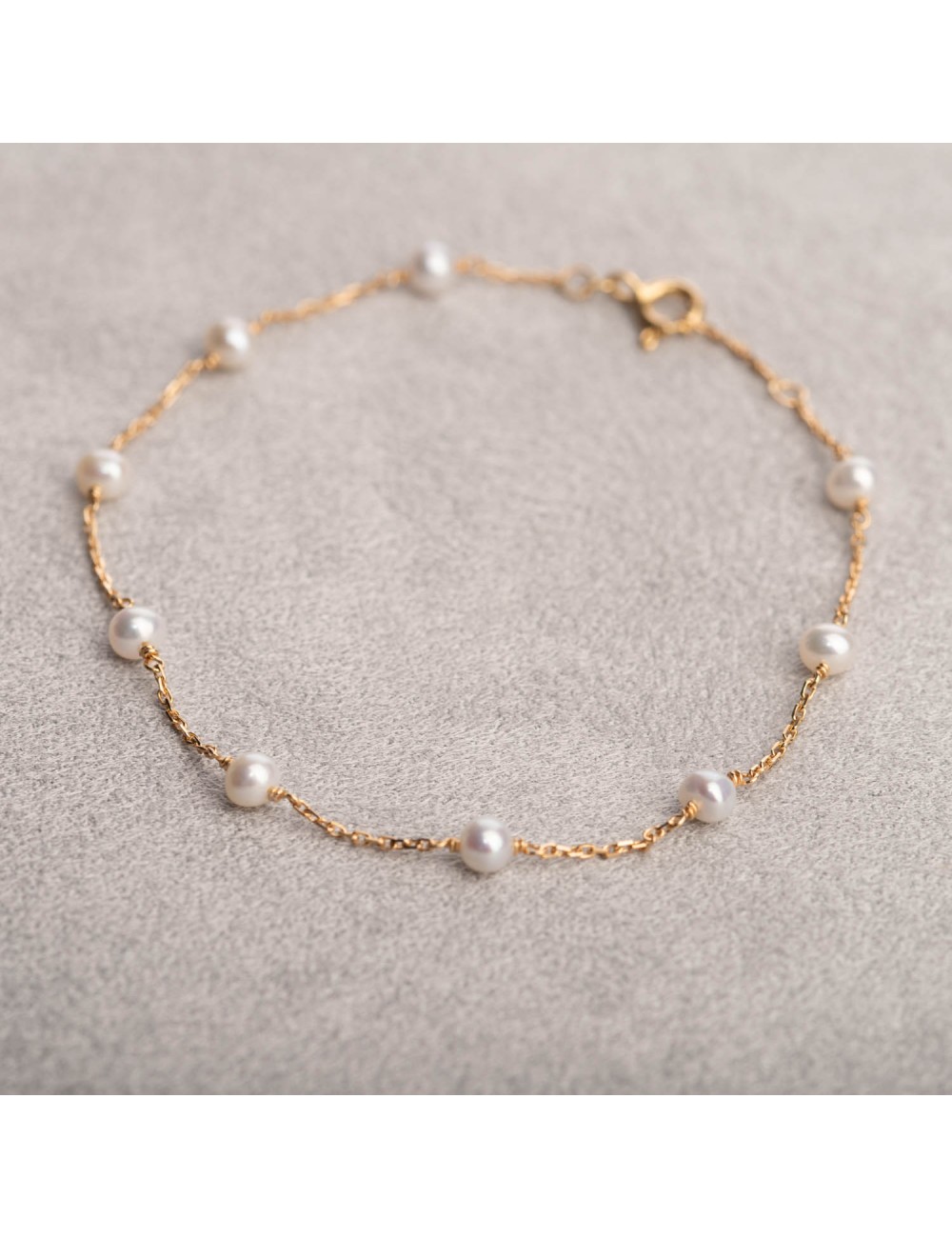 Bracelet femme neuf perles d'eau douce sur chaîne en or 18 carats.