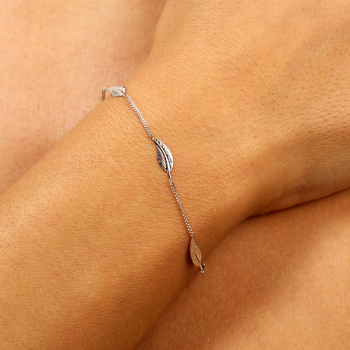 Bracelet femme cinq plumes en or 9 carats.